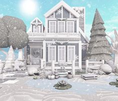 a snow covered house surrounded by trees and rocks