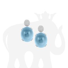 JE0098-BT 'Rock 'N Roll' Blue Topaz Oval Cabochon with Diamonds Motif Earrings in 18K Gold Stone size: 20 x 17 & 9.5 mm Approx. gemstone Wt: 58.90 Carats Diamonds: G-H / VS, Approx. Wt: 0.49 Carats Luxury Blue Oval Cabochon Earrings, Luxury Oval Cabochon Diamond Gemstones, Elegant White Gold Cabochons For Formal Occasions, Luxury White Gold Diamond Cabochons, Luxury Oval Cabochon Gemstones, Luxury Diamond Cabochons For Formal Occasions, Luxury Oval Gemstone Cabochons, Luxury White Gold Oval Cabochons, Exquisite Cabochon Earrings For Formal Occasions