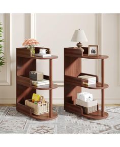 two bookshelves sitting next to each other on top of a carpeted floor