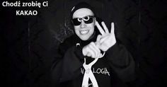 a man in sunglasses and a black hoodie making the peace sign with his hands