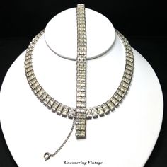 *Description: This is a great mid-century square clear rhinestone choker necklace and matching bracelet from the 1950s.  This style was also made and signed by Weiss in the late 1940s and early 1950s.  This set is unsigned.  The choker and bracelet have two square prong set rhinestones per row.  The necklace is 14 1/2 Inches and the bracelet is 7 inches and both have a hidden box clasp.  The matching bracelet and necklace are 3/8 inches wide. The bracelet also has a safety chain with a spring ri Vintage Formal Rhinestone Choker Necklace, Nickel-free Vintage Choker Necklace, Vintage Nickel-free Choker Necklace, Vintage Rhinestone Choker Necklace, Vintage Metal Rhinestone Necklace, 1950s Jewelry, Rhinestone Choker Necklace, Rhinestone Choker, Bracelet Women