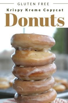 a stack of doughnuts sitting on top of each other in front of the words gluten free krispy kreme copycat donuts