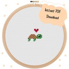 a cross stitch pattern with an image of a turtle