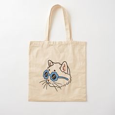 a tote bag with a drawing of a cat wearing sunglasses on it's face