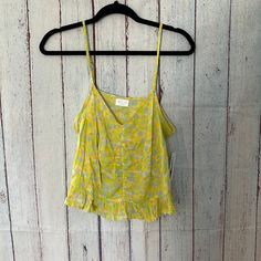 Nwt. Gorgeous Spring Colors! Tank From Abound Size Medium. Ruffle Hem. Adjustable Straps. Length Measures 23 Inches Pit To Pit Measures 18 Inches Green Camisole For Beach In Spring, Green Spring Vacation Camisole, Spring Vacation Printed Camisole, Printed Camisole For Spring Vacation, Yellow Summer Camisole For Vacation, Casual Yellow Camisole For Vacation, Casual Spring Camisole For Daytime, Casual Spring Daytime Camisole, Spaghetti Strap Blouses