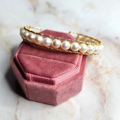 Freshwater Pearl Bangle Bracelet Gold Plated Never Used Smoke Free, Pet Hypoallergenic Friendly Same/Next Day Shipping Follow Me On Insta Kikipluslulu Open To Offers White Jewelry With Round Bracelet Strap, White Round Jewelry With Bracelet Strap, Pearl White Bangle Bracelet Gift, Pearl White Bangle Bracelets For Gifts, Pearl White Bangle Bracelet For Gift, Elegant White Round Cuff Bracelet, White Oyster Bracelet Bangle, Adjustable Pearl White Jubilee Bracelet, White Pearl Bangle As A Gift