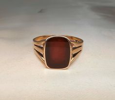 1900s Antique German Carnelian Signet Ring, 8k rose gold ring, hallmarked, US Size 11 1/4, with a beautiful oval carnelian stone (9 x 12 mm), in good vintage condition. Material: 8k gold, carnelian Total weight: 4.8 g US Size: approx. 11 1/4 (EU size 66) PLEASE LOOK AT THE PICTURES, THEY ARE PART OF THE DESCRIPTION AND ARE THE ACTUAL ITEM YOU WILL RECEIVE. Classic Carnelian Signet Ring For Formal Occasions, Classic Carnelian Signet Ring For Formal Events, Elegant Brown Signet Ring For Formal Occasion, Elegant Formal Brown Signet Ring, Formal Oval Carnelian Signet Ring, Formal Carnelian Oval Signet Ring, Vintage Oval Carnelian Signet Ring, Classic Oval Brown Ring, Vintage Carnelian Ring For Formal Occasions