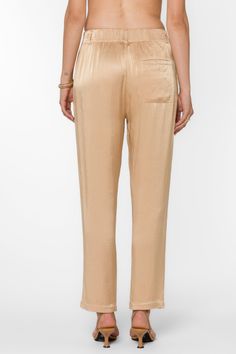 Expertly crafted with pull-on design, Sherona Pants combine luxurious satin material with functional features such as fly front and belt loops. Enjoy ultimate comfort and convenience in these elegant pajama pants. Material: 100% Viscose Color: Sesame Hand wash or dry clean Model is 5'9'' and is wearing a size S Imported The White Album, Satin Material, New Tops, Top Sales, Jacket Sale, Skirt Pants, Jacket Outfits, Sweater Jacket, Outerwear Jackets