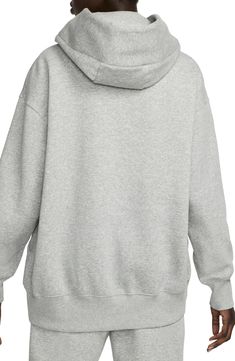 Exaggerated features like an oversized kangaroo pocket and extra tall ribbing add to the roomy feel of this sporty hoodie with a cozy brushed fleece interior. Drawstring hood 80% cotton, 20% polyester Machine wash, dry flat Imported Comfortable Gray Hoodie With Drawstring Hood, Comfy Gray Hooded Sweats, Oversized Sportswear Hoodie With Ribbed Cuffs, Gray Cozy Hoodie With Drawstring, Cozy Gray Hoodie With Drawstring, Cozy Sports Sweatshirt With Adjustable Hood, Heather Grey Hoodie With Kangaroo Pocket, Comfy Sports Hoodie For Winter, Heather Grey Hoodie With Kangaroo Pocket In Relaxed Fit