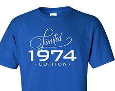 a blue t - shirt that says limited 1974