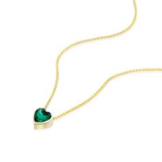 Express your love with the delicate beauty of this Emerald heart gold necklace. This stunning choker features a green gemstone pendant, in a solid gold 14K necklace, the perfect May birthstone jewelry. Product Details: ✤ Lab-grown Emerald, heart cut 6x6 mm ✤ 14K solid yellow/rose/white gold ✤ Packed in a luxurious gift box ✤ Fully Insured And Discreetly Packaged   Shipping: ✤ Free worldwide shipping. ✤ Shipped using FedEx/DHL were available, insured and trackable express shipping. ✤ Please add y Green 14k Gold Heart Jewelry, Green Heart-shaped 14k Gold Jewelry, Green Necklace With Heart Charm For Anniversary, Green Heart Charm Necklace For Anniversary, Fine Jewelry May Birthstone Heart Cut Necklace, Green 14k Gold Heart Pendant Necklace, Green Emerald Heart Pendant Necklace, Green Heart-shaped Fine Jewelry Necklace, Gold Heart-cut May Birthstone Necklaces