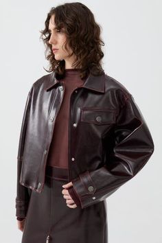 Classic details lend authenticity to a faux-leather cropped jacket that boasts all the smooth swagger of genuine leather. It features a regular fit, lining, long sleeves, pockets, snap fastenings, a front flap pocket design, and a distressed faux leather finish. Spot Clean Material: 75% Polyurethane, 25% Polyester Long Sleeve Officially licensed Imported Brand: Nocturne Model Product Size: S Model Size: Height 5'10 / Bust 29.5 in / Waist 23 in / Hips 34 in Runs smaller order one size up. Please check the size char Nyc Fall, Blazer Jackets For Women, Leather Finish, Fall Jackets, Cropped Jacket, Fashion Editor, Crop Jacket, New Trends, S Models