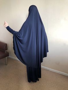 Unique maxi dress with khimar cape made by shiny jersey. Elegant abaya with a long sleeve, high cuff. The cuffs and hem dresses are decorated with lace. The warmth is slightly enlightened, so we sewed khimar cape lice a hijab for this dress! Free size Be feminine and beautiful, we are always happy to help you in your choice, you can write any questions in the message. We accept individual orders, this means that we can sew a dress of any size, style and color! Blue Modest Khimar For Eid, Blue Long Khimar For Eid, Long Blue Khimar For Eid, Modest Long Sleeve Solid Khimar, Blue Modest Long Abaya, Modest Blue Niqab For Eid, Blue Long Sleeve Modest Khimar, Modest Blue Maxi Length Abaya, Unique Maxi Dresses