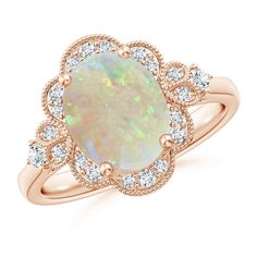 an opal and diamond ring in rose gold