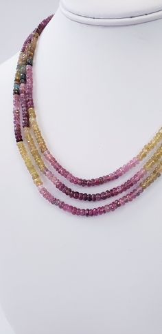 Tourmalines are given a center stage to turn on their full-color show. From dark greens to yellows and pinks, tourmaline has it all. The 3 strands multicolor necklace is eager to transmit to you this gemstones' qualities: tourmaline attracts inspiration, compassion, tolerance, and prosperity. *Natural Multi Tourmaline Rondelle Faceted Beads, *Stones: Watermelon Tourmaline *Clasp: Surgical steel *End to end Length: 18 Inches *Bead Size: 3.5-3.8 mm approx. *Carat wt.: 204.58Ct FREE Shipping and Gi Pink Tourmaline Necklaces With Round Beads, Tourmaline Gemstone Beads Necklaces, Tourmaline Single Strand Necklace With Round Beads, Pink Tourmaline Beaded Necklaces, Multicolor Faceted Tourmaline Necklaces, Tourmaline Gemstone Beaded Necklaces With Round Beads, Beads Watermelon, Watermelon Tourmaline Necklace, Multicolor Necklace