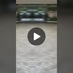 a blurry image of a car driving down the street