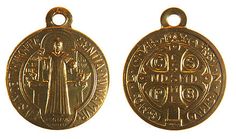 two gold medals with an image of the virgin mary on one side and jesus on the other