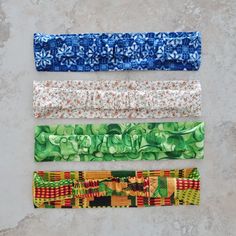 "Fabric hairbands are sized for adults or teen ladies and come in a choice of 4 fabric designs. The hairband is a double layer of quality cotton fabric prints with a covered fabric elastic band on the back. Elastic band will allow for an adjustable fit 23\"-24\". The width of the band is 2 1/4 \". If you think you need another size, they can be customized depending on fabric availability. Offered in this listing is a Rasta print, a green swirl print, a country mini floral print, and a blue block Headbands Fabric, Blue Block Print, Country Floral, Green Country, Earring Storage, Fabric Prints, Fabric Headbands, Fabric Designs, Earring Holder