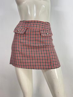 "Mini skirt, plaid mini skirt, united colors of Benetton, micro mini skirt, 23\"-24\" waist  Measurements:  Waist 11.5\"-12\"/hip 16.5\"-17\"/length 13.5\" Mannequin measurements:  5'8\", bust 34\", waist 25\", hip 33\" Please note that vintage clothing sizes can vary greatly.  The Measurements provided  are approximate and are taken lying flat.  I suggest taking a similar garment from your wardrobe and measure it while lying flat.  This way you can compare measurements.  All of our pieces are g Preppy Plaid Mini Skirt For School, School Fitted Plaid Mini Skirt, Spring Fitted Plaid Skort, Casual Fitted Plaid Skort, Plaid Skirted Skort For School, Fitted Plaid Tennis Skirt For School, Casual Fitted Gingham Skort, Casual Gingham Fitted Skort, Plaid Cotton Mini Skirt Skort