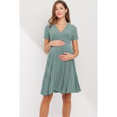 This lovely and flowy maternity dress will make you the talk of the town. It has a gentle sage color with comfortable pleats. The V-neck design is very nursing friendly going from pregnancy to postpartum. You glow girl! FEATURES: Soft and stretchy Flowy and comfortable pleats Knee-length Made in USA WHAT ABOUT THE FABRICS? Fabric Content: 95% Polyester and 5% Spandex GARMENT CARE Wash gentle cycle cold with like colors - Do not bleach - Dry low/iron low when needed Spring Maternity V-neck Dress Nursing Friendly, Modest Flowy Maternity Dress, Solid V-neck Maternity Dress, Casual Green Maternity Dress, Green V-neck Maternity Dress, Green V-neck Maternity Dress For Summer, Green Nursing Friendly Maternity Dress, Green Nursing-friendly Maternity Dress, Nursing-friendly Green Maternity Dress