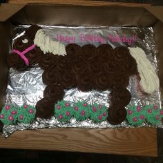 a birthday cake in the shape of a horse