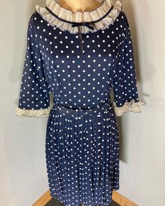 Just absolutely gorgeous!  Bust:   38 waist: 30 Length:39 1950s Ruffled Vintage Dress, 1950s Vintage Dress With Ruffles, 1950s Style Vintage Dress With Ruffles, Retro Vintage Dress With Ruffles, Vintage Polka Dot Dress For Daywear, Vintage Polka Dot Lined Dresses, 1950s Style Polka Dot Vintage Dress, 1950s Style Ruffled Dresses For Vintage Fashion, Fitted Retro Swiss Dot Dress