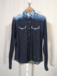 Tomas Maier Spring 2015 Runway Bleach Indigo Western Denim Snap Shirt $299 S. Pit to pit: 19" Length: 25" Shoulders: 16" Shoulder to cuff: 27* Fitted Washed Denim Blue Shirt, Fitted Denim Top With Spread Collar, Fitted Dark Wash Shirt For Summer, Fitted Dark Wash Shirt For Spring, Distressed Fitted Casual Shirt, Fitted Distressed Casual Shirt, Casual Fitted Distressed Shirt, 2015 Runway, Casual Button Down Shirts