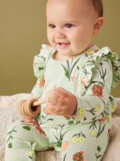 Let's hear it for one-and-done dressing! So stylish and sweet, this long sleeve romper has a cute keyhole back detail, convenient inseam snaps, and adorbs shoulder ruffles. The gorgeous floral print is from our Sweden collection. Matching family styles are available in our Sibling Shop. Visit our Global Shop to see more of our favorite styles from around the world. Tea Collection, Sleeved Romper, Long Sleeve Romper, Baby Romper, Original Image, Crew Neckline, Sweden, Ruffles, Jumpsuit Romper