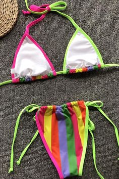 Cute two piece swimsuit featuring a sliding triangle bikini swim top with pad cups, adjustable straps tied on neck and back, and a pair of ruched bikini bottom with tied side string in cheeky fit. Allover in contrast color.Size Guide:Size (in)USBustWaistHipS4-631-3324-2635-37M8-1033-3526-2837-39L12-1435-3728-3039-41 String Swimwear For Sunbathing, String Swimwear For Sunbathing And Beach Season, String Beachwear For Beach Party, Beach Season Swimwear With Adjustable Straps And Tie-side Bottom, Adjustable Straps Tie-side Bottom Swimwear For Beach Season, Summer String Swimwear For Swimming, Sunbathing Swimwear With Drawstring And String Shape, String Swimwear For Summer Swimming, Drawstring Tie-side Bottom Swimwear For Beach Season