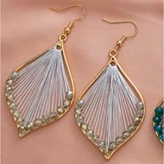 Gorgeous Hand Woven Bohemian Earrings Are Light And Elegant Made With High Quality Materials Including Cotton Thread And Hypoallergenic Gold Accents Hypoallergenic Metal Post Nwt - New With Tags! Color For This Pair Is - Silvery Blue #Fringeearrings #Tassel #Fringe #Tasselearrings #Bohemian #Bohemianearrings #Dropearrings #Festivalearrings #Anthro #Anthropologie #Freepeople #Gypsy #Gypsyearrings Summer Metal Beaded Earrings For Pierced Ears, Summer Metal Beaded Earrings, Silver Single Beaded Earring For Party, Silver Teardrop Beaded Earrings Bohemian Style, Bohemian Silver Teardrop Beaded Earrings, Silver Teardrop Jewelry For Summer, Elegant Wrap Earrings For Festivals, Silver Metal Beaded Earrings, Silver Metal Beaded Earrings For Festivals