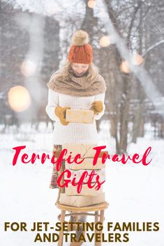 a woman standing in the snow with presents on her feet and text overlay that reads,