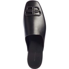 These black Balenciaga BB logo leather slipper shoes feature a square toe, slip-on design, flat sole and BB logo plaque.Calfskin leather with leather soleRubber tap heelMatte black-tone BB logo detail Composition: Leather 100%Lining Composition: Leather 100%Sole Composition: Leather 100% Fits true to sizeDisigner ID: 590935 WA722 Made in Italy Black Square Toe Calf Leather Loafers, Black Square-toe Calf Leather Loafers, Designer Square Toe Mules With Branded Insole, Designer Mules With Branded Insole And Square Toe, Black Square Toe Mules, Luxury Loafers With Branded Insole And Square Toe, Bb Logo, Black Balenciaga, Balenciaga Black