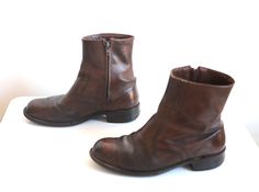 1960s 70s chelsea Beatle Boots Men's size 8.5 EE.  PLEASE consult measurements for best fit! Interior sole length - 10 3/4 inches Width at widest - 4 1/4 inches Heel - 1 1/4 inches brown leather upper Great condition! Some general and normal wear, including some subtle cracking along the toes.  Nothing major! SantaFe1 Vintage Brown Leather Chelsea Boots, Beatle Boots, Chelsea Boots Mens, Buckle Boots, Brown Vintage, Boots Brown, 4 Inch Heels, Brown Boots, Boots Men