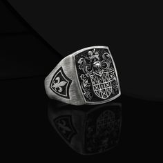 Custom Crest Signet Ring Coat Of Arms Ring Custom Rings For Men Silver Crest Signet Coat Of Arms Ring Men Unique Heraldic Family Crest Ring Made to Order Designs Details Metal: 925k Sterling Silver Weight:18-20 gram Color: Oxidized Silver Color ( color customizable ) Style: Family Crest / Coat Of Arms Dimensions : 0.7 x 0.7 inch Can be personalized  3D Style Handmade Design Contact us at this link freyjewelrydesign.etsy.com Personalized Engrave Service ● Design Silver Rings ● Custom Personalized Gift ● 925k Sterling Silver Material  ● Personalized Heraldic Ring ● Personalized Jewelry  ● Custom Engrave Ring ● Custom Engrave Ring ● Custom Family Crest Ring  ● Coat Of Arms Silver Ring  ● Signet Ring Man  ● Personalized Heraldic Ring  ● Unique Silver Rings For Man Custom Design Gift ● This Han Classic Coat Of Arms Collectible Rings, Silver Heirloom Signet Ring Tarnish Resistant, Heirloom Silver Tarnish-resistant Signet Ring, Formal Silver Rings With Coat Of Arms, Rings For Men Silver, Family Crest Ring, Rings For Man, Family Crest Rings, Custom Signet Ring