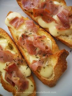 three pieces of bread topped with ham and cheese