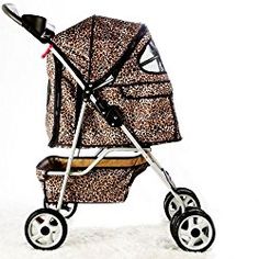 a baby stroller with a leopard print cover on it's side and wheels