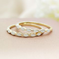 The Gold Scallop Stacking Breastmilk Ring features scallop shaped breast milk stones. The breast milk stones can go all the way around the band or half way around the band. ❤Please note： This is a DIY kit for you to make your own jewelry. If you want us to make your jewelry, please feel free to contact us for details. ❤Specification: - Material: 10k solid gold - Color: rose gold, white gold, yellow gold - Band width: 2.5mm - Breastmilk stone size: 1.2x3.8mm - Ring size: 4-11,(All sizes available, please feel free to contact me if you need another ring sizes) ❤The DIY kit includes everything you need for making the ring: - Breastmilk preservation - Liquid A, Liquid B - Plastic cup, syringe, mixing stick, plastic bag, silicone mold, plastic pipette - One 10k solid ring with a 10k stamp on th Breast Milk Jewelry Rings, Breastmilk Ring Jewelry, White Stackable Jewelry For Gifts, Breast Milk Jewelry Diy, White Oval Enamel Ring Gift, Adjustable White Enamel Ring, Adjustable White Moonstone Stackable Ring, Adjustable White Stackable Moonstone Ring, White Stackable Moonstone Ring For Anniversary