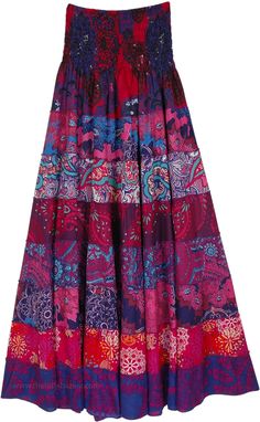 A dreamy, vibrant, and eclectic rayon piece that can be worn as a dress or a skirt.  With its smocked waist, the piece sits well on the waist or the chest. #tlb #TieredSkirt #vacationclothing #beachwrap #Floral #Printed #TieredSkirtDress #SummerDress Bohemian Dress With Smocked Back And Tiered Skirt, Bohemian Dress With Flowy Gathered Skirt, Bohemian Dress With Gathered Flowy Skirt, Bohemian Tiered Dress With Relaxed Skirt, Casual Tiered Skirt Dress For Festivals, Bohemian Dress With Gathered Tiered Skirt, Bohemian Dress With Relaxed Tiered Skirt, Multicolor Gathered Skirt Dress For Spring, Bohemian Tiered Multicolor Skirt