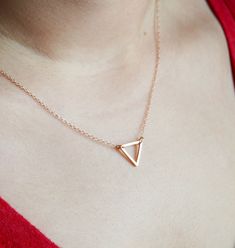 Handmade and Shipped from the USA 🇺🇸 FOR A LIMITED TIME PLEASE ENJOY 15% OFF AND FREE SHIPPING IN THE USA My production time is currently 1 week before shipping (See shop announcement for more details). ❤️ This listing is for a beautifully hand crafted dainty, yet simple, Shiny Rose Gold Triangle Tiny Charm Pendant Necklace. This necklace is perfect for everyday wear and goes with everything (you won't ever want to take it off). This dainty, minimalist style type of jewelry also makes the perf Triangle Jewelry, Valentines Gift For Her, Gold Triangle, Tiny Charm, Triangle Necklace, Geometric Necklace, Charm Pendant Necklace, Valentines Gifts For Her, Necklace Dainty