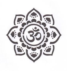 an ombretta with the symbol of yoga on it's center piece in black and white