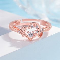 Revel in the charisma of this 18k rose gold-plated, adjustable ring as it garnishes your hand. Glimmering cubic zirconia accentuates its modern design, lending a touch of allure to your look. 0.35'' W x 0.35'' H 18k rose gold-plated copper / cubic zirconia Diamond Ring Vintage, Dancing Diamond, Ring Sale, Adjustable Ring, Adjustable Rings, 18k Rose Gold, Rose Gold Plates, Heart Ring, Cubic Zirconia