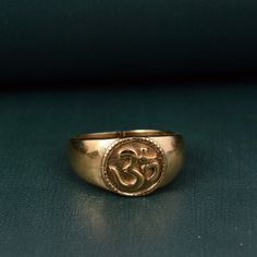 Om Ring, Signet Ring, Ohm Ring, Designer Brass Ring, Vintage Ring, Dainty Ring, Handmade Ring, Meditation Ring, Religious Ring, Yoga Ring Size:- All Size Available In Variation Metal:- Brass ❥ Customers satisfaction is our biggest priority, please contact us with any questions/queries for future or existing orders, and we will do our best to make sure you are happy with your order. ❥Please make sure to add the correct address during check out. You can return your purchased item within 15 days af Handmade Symbolic Signet Ring For Wedding, Symbolic Brass Engraved Ring For Wedding, Spiritual Hallmarked Open Ring, Symbolic Adjustable Brass Rings, Symbolic Brass Wedding Rings, Brass Spiritual Promise Ring, Spiritual Brass Promise Ring, Spiritual Brass Open Ring, Brass Rings Gift With Round Band