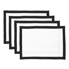 four black and white napkins on a white background