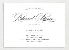 an elegant dinner party card with the word's name in brown ink on white paper