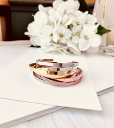 This cuff bracelet is perfect for stacking and everyday wear.This listing is only for a single bracelet.Adjustable bangle. ONE size. fit any size wrist from 6"- 7.5" Width - 4mm.16K Gold- plated • Silver-plated • Rose gold plated - Not easily tarnished. C A R E | T I P SAll pieces are protected with an anti-tarnish barrier. In order to maximize the life of your handmade jewelry, we suggest following the below care instructions:We don’t want your special moment to fade. To maintain the quality of Rose Gold Cuff Bracelet, Single Bracelet, Adjustable Bangle, Gold Plated Silver, Rose Gold Plates, Cuff Bracelet, A R, Silver Plate, Silver Plated