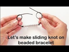 two hands are holding up some string to make a beaded eyeglass holder with the words, let's make sliding knot on beaded bracelet