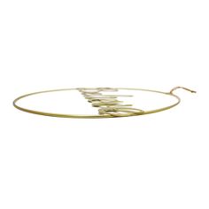 a gold plated metal hoop with five small leaves on it