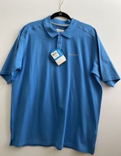 Relaxed Fit Collared Sports Top, Casual Collared Sports Top, Casual Collared Top For Sports, Blue Collared Sporty Tops, Casual Long Sleeve Sports Polo Shirt, Blue Cotton Tops For Outdoor, Outdoor Blue Cotton Tops, Blue Cotton Polo Shirt For Sports, Solid Color Collared Sports Top