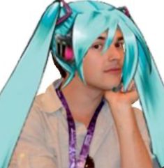 a young man with blue hair wearing a wig and headphones on top of his head