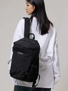 This is a casual and unique bag by BSMT that is made out of high quality and sturdy material. With distinctive mood of the design and comfortable wear, you can style it for your casual daily outfit.- String and stopper on side pocket- Minimal logo embroidery detail- Casual and trendy mood Practical Nylon Backpack For Streetwear, Modern Black Nylon Backpack, Streetwear Nylon Backpack With Multiple Pockets, Black Backpack With Zipper Closure For Streetwear, Streetwear Nylon Standard Backpack, Light Backpack, Unique Bags, Embroidery Details, Black Backpack